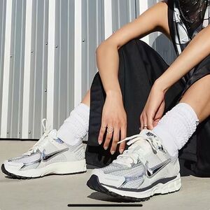 Nike Women's Silver and White Sneakers